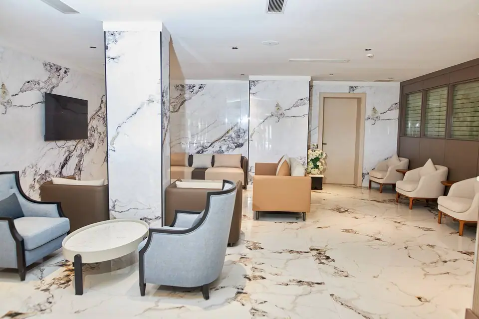 Hotel lounge with elegant marble floors and seating